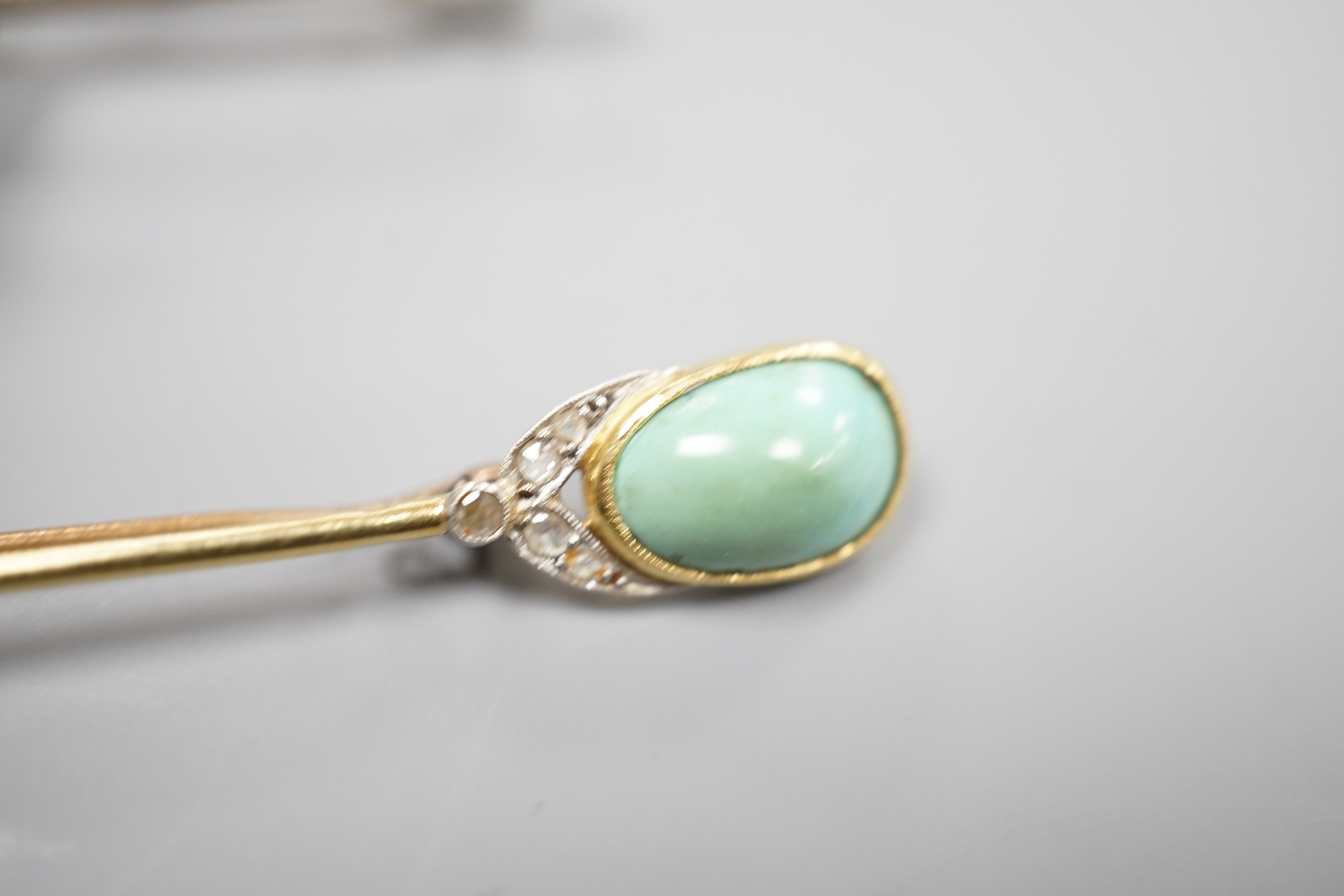 A yellow and white metal, rose cut diamond set fox head bar brooch, 62mm and a yellow metal, rose cut diamond and turquoise set bar brooch, gross weight 11.6 grams.
